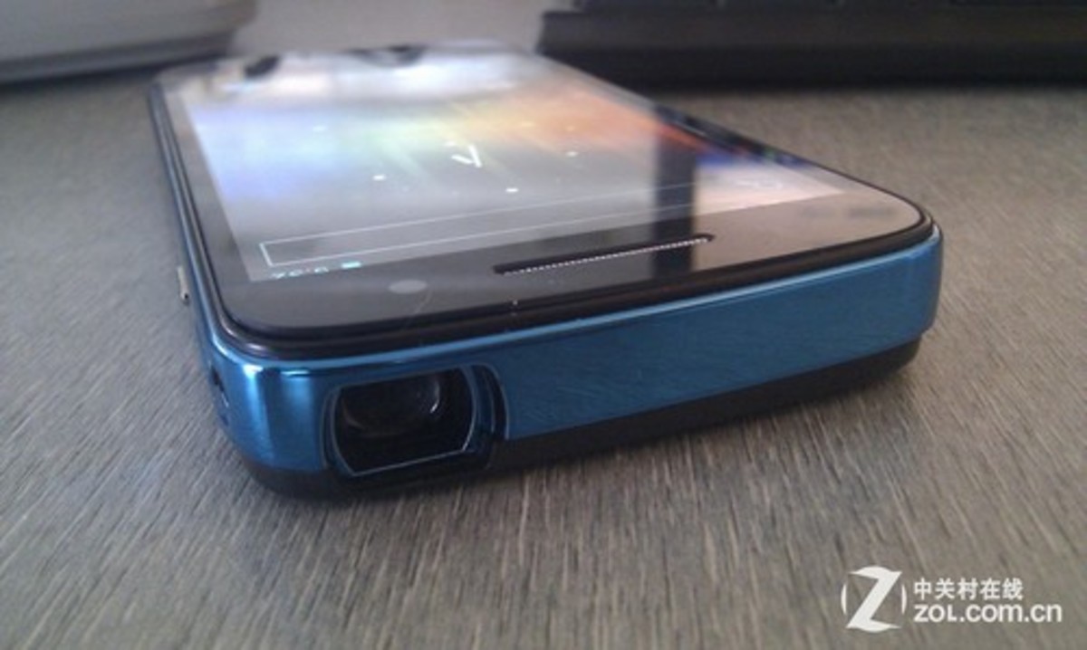 【高清图】 苹果也搞不定 为何投影手机一直玩不转?图1